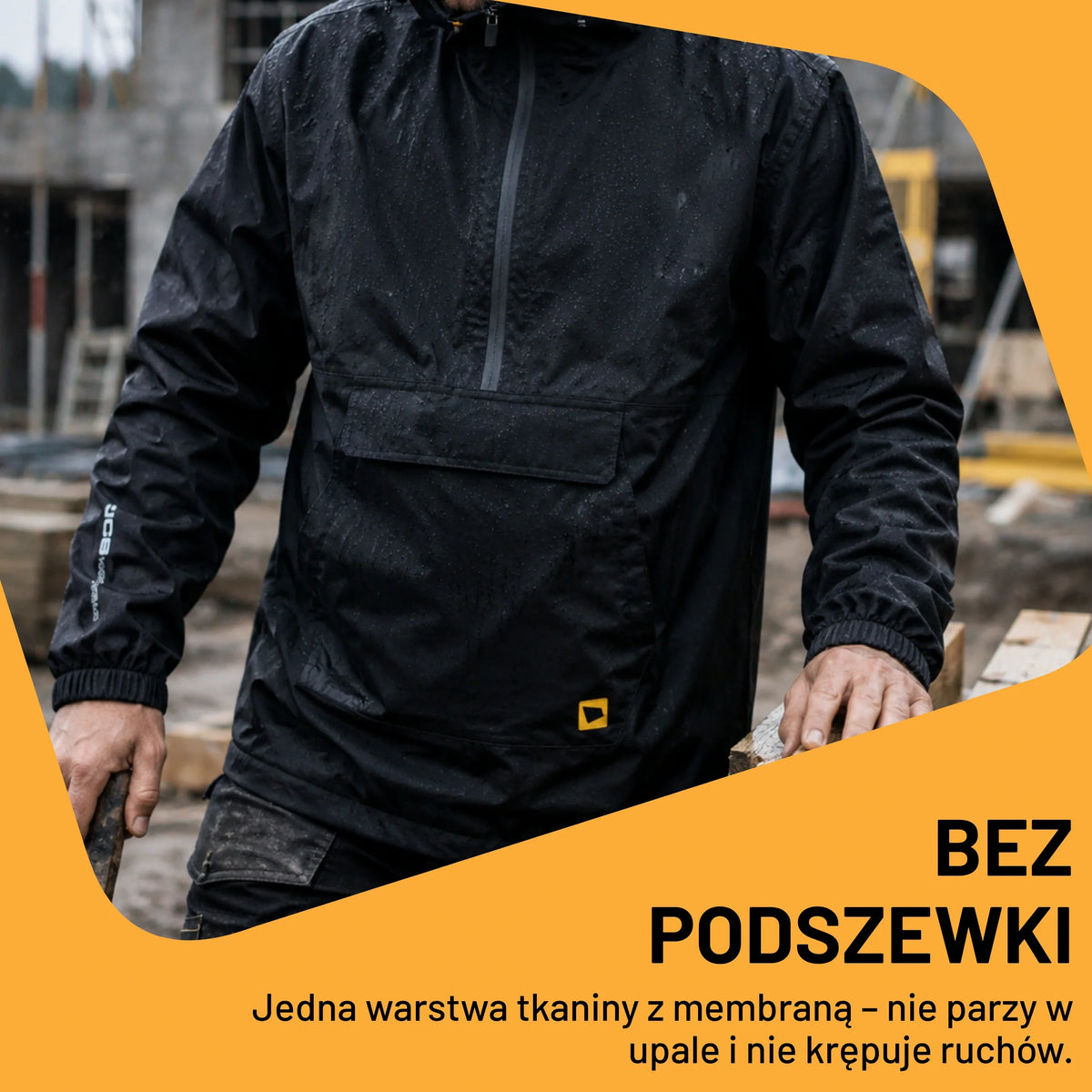 Mężczyzna w kurtce JCB008BL na budowie, tekst ikono grafiki Bez Podszewki